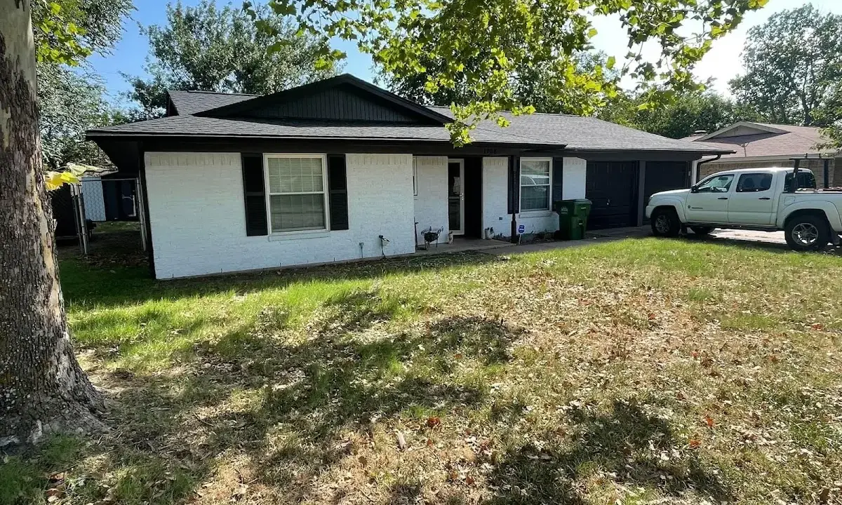 Professional roofing crew working on a residential roof in Union Grove